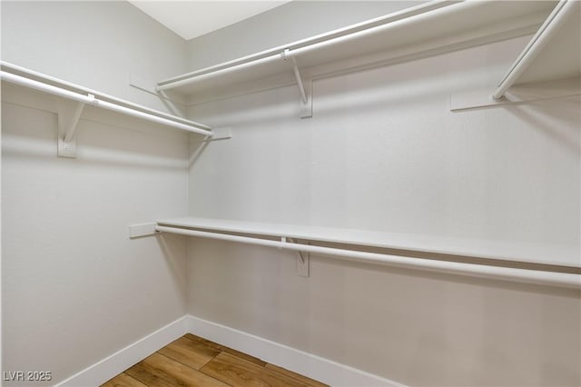 6388 Canyon Dawn Ave, Las Vegas, NV 89108 - spacious closet featuring light wood-type flooring