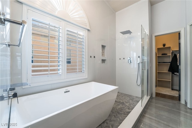 2144 Paganini Ave, Henderson, NV 89052 - full bath with walk in shower, a soaking tub, a spacious closet, and plenty of natural light