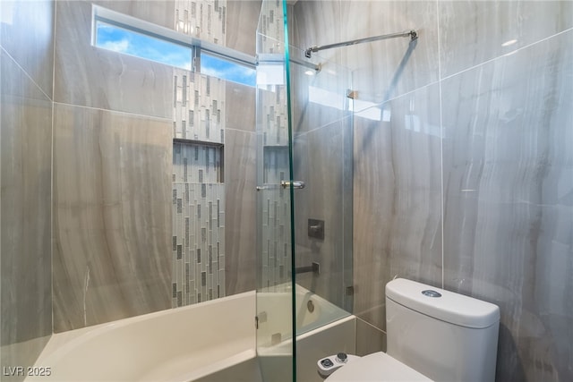 2144 Paganini Ave, Henderson, NV 89052 - full bathroom featuring bath / shower combo with glass door and toilet