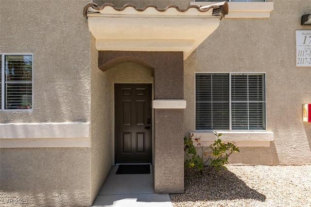 9050 W Warm Springs Rd Unit 1117, Las Vegas, NV 89148 - entrance to property featuring stucco siding