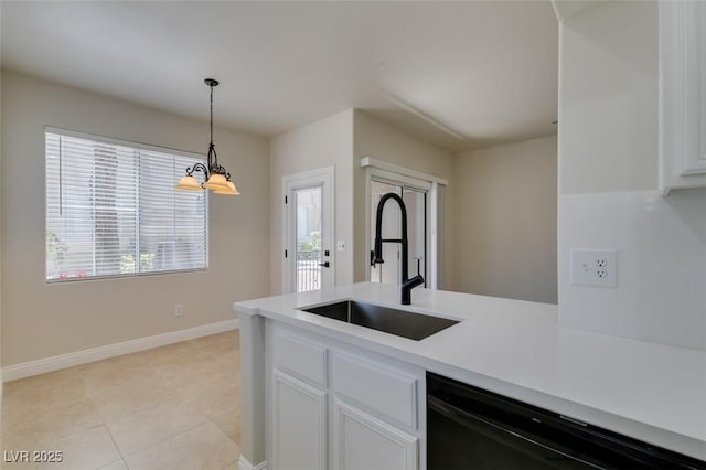 9050 W Warm Springs Rd Unit 1117, Las Vegas, NV 89148 - kitchen featuring a sink, black dishwasher, white cabinetry, light countertops, and a chandelier