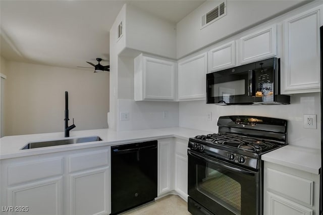9050 W Warm Springs Rd Unit 1117, Las Vegas, NV 89148 - kitchen featuring black appliances, a sink, white cabinets, and a ceiling fan