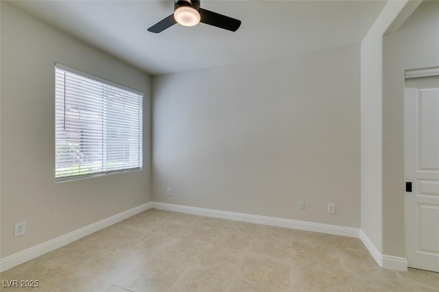 9050 W Warm Springs Rd Unit 1117, Las Vegas, NV 89148 - unfurnished room featuring a ceiling fan, baseboards, and light tile patterned floors