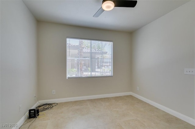 9050 W Warm Springs Rd Unit 1117, Las Vegas, NV 89148 - empty room featuring ceiling fan, baseboards, and light tile patterned flooring