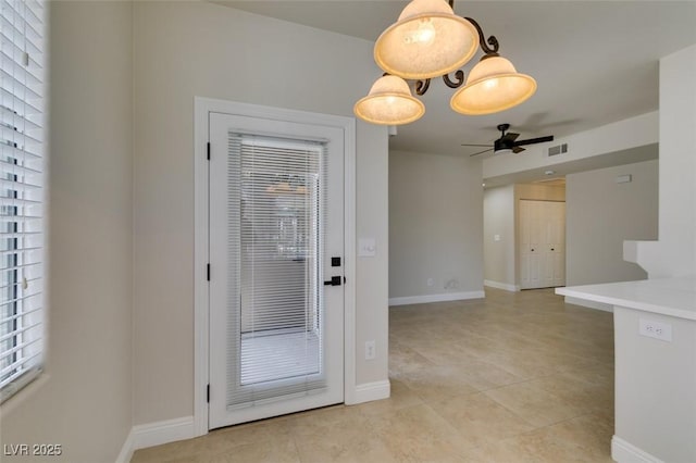 9050 W Warm Springs Rd Unit 1117, Las Vegas, NV 89148 - unfurnished room featuring a ceiling fan, light tile patterned floors, baseboards, and healthy amount of natural light