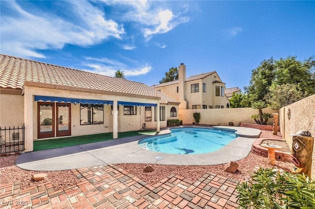 8428 Apple Hill Ct, Las Vegas, NV 89128 - view of pool featuring a fenced backyard, a patio, and french doors