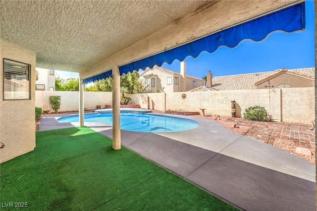 8428 Apple Hill Ct, Las Vegas, NV 89128 - view of swimming pool with a fenced backyard and a patio area