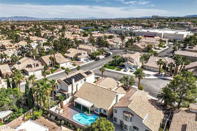 8428 Apple Hill Ct, Las Vegas, NV 89128 - aerial view of residential area with a mountain backdrop and a pool