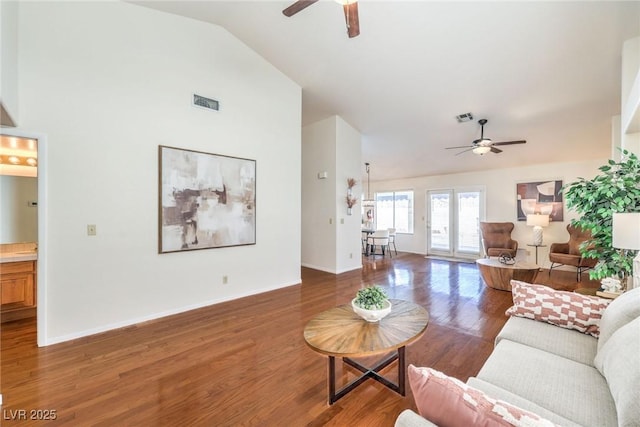 8428 Apple Hill Ct, Las Vegas, NV 89128 - living area featuring ceiling fan, lofted ceiling, wood finished floors, and baseboards