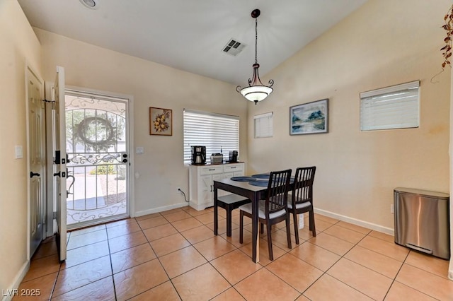 3823 Aspen Creek Ave, North Las Vegas, NV 89031 - dining room with light tile patterned floors and baseboards