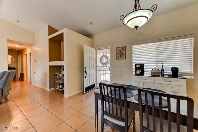 3823 Aspen Creek Ave, North Las Vegas, NV 89031 - dining space with light tile patterned floors and baseboards