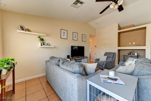 3823 Aspen Creek Ave, North Las Vegas, NV 89031 - living area with vaulted ceiling, ceiling fan, light tile patterned floors, and baseboards