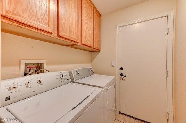 3823 Aspen Creek Ave, North Las Vegas, NV 89031 - laundry room featuring washer and dryer, cabinet space, and light tile patterned floors