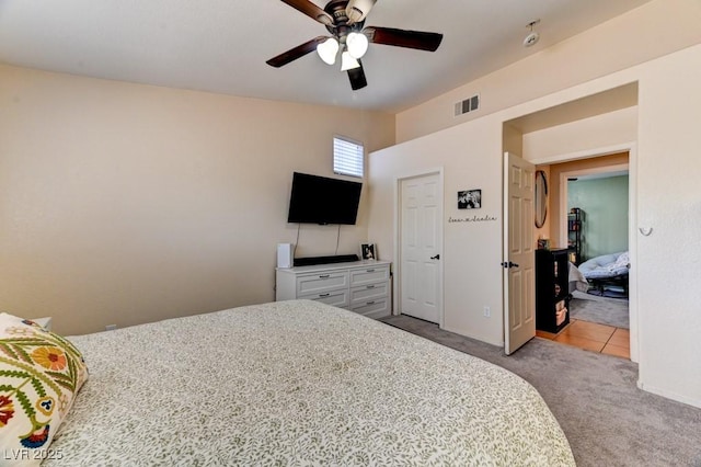 3823 Aspen Creek Ave, North Las Vegas, NV 89031 - bedroom with light colored carpet and ceiling fan