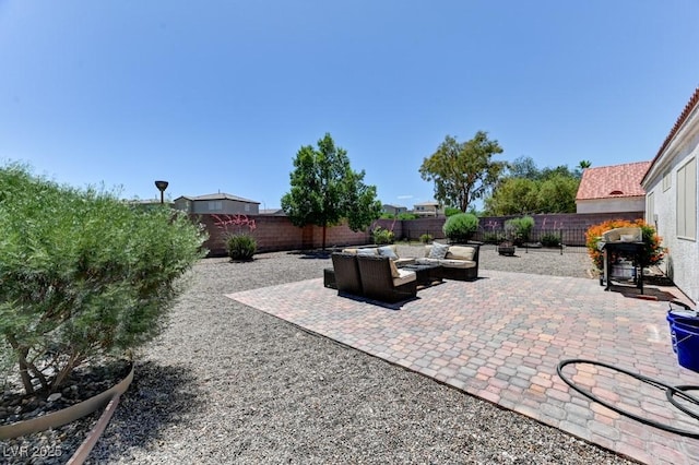 3823 Aspen Creek Ave, North Las Vegas, NV 89031 - fenced backyard with an outdoor hangout area, a patio, and area for grilling