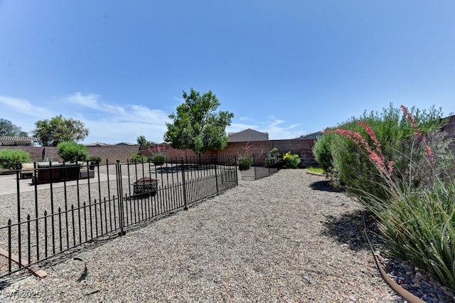 3823 Aspen Creek Ave, North Las Vegas, NV 89031 - fenced backyard with a patio