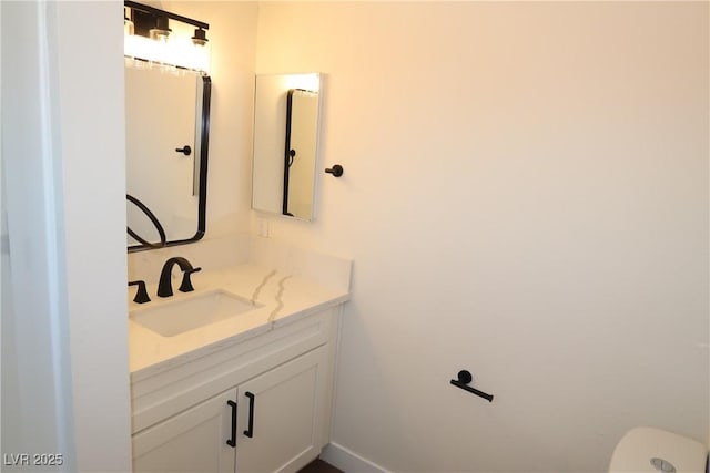 404 Vassar Ln, Las Vegas, NV 89107 - half bathroom featuring vanity and toilet