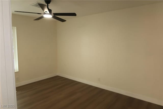 404 Vassar Ln, Las Vegas, NV 89107 - empty room with dark wood-style floors, baseboards, and ceiling fan