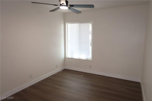 404 Vassar Ln, Las Vegas, NV 89107 - empty room featuring dark wood-type flooring, a ceiling fan, and baseboards
