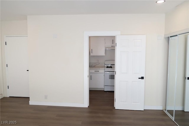 404 Vassar Ln, Las Vegas, NV 89107 - interior space featuring dark wood-style flooring, recessed lighting, and baseboards