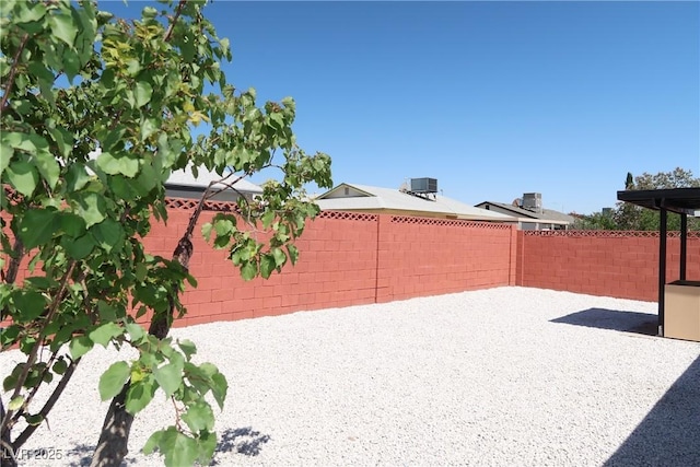 404 Vassar Ln, Las Vegas, NV 89107 - fenced backyard featuring a patio area