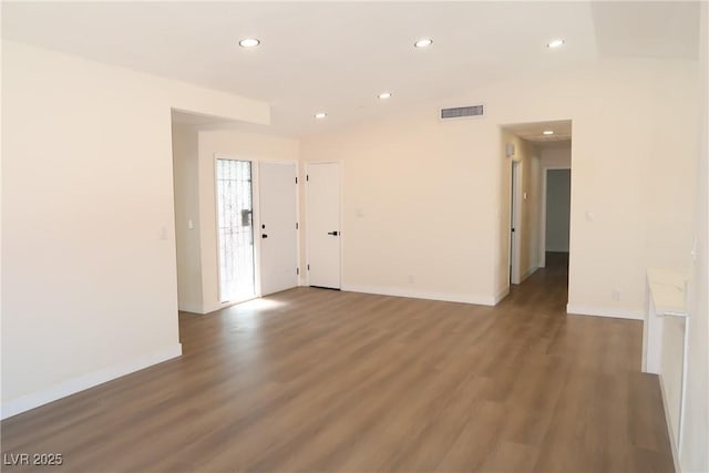 404 Vassar Ln, Las Vegas, NV 89107 - spare room with wood finished floors, recessed lighting, and baseboards