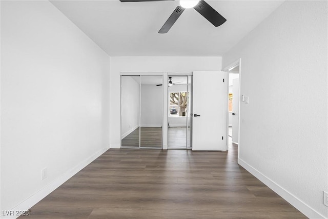 404 Vassar Ln, Las Vegas, NV 89107 - unfurnished bedroom with baseboards, wood finished floors, and ceiling fan