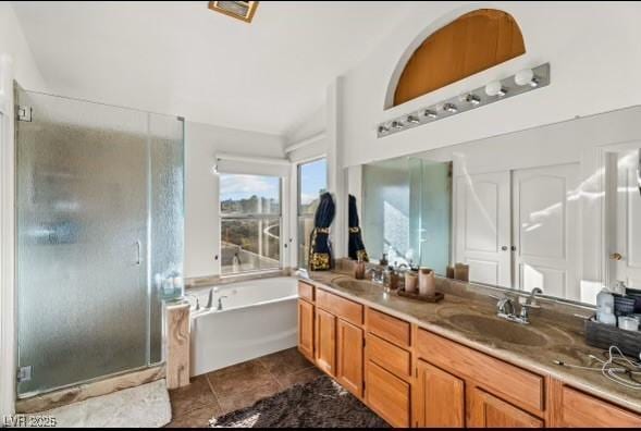59 Desert Dawn Ln, Henderson, NV 89074 - bathroom with a bath, a shower stall, double vanity, and tile patterned floors