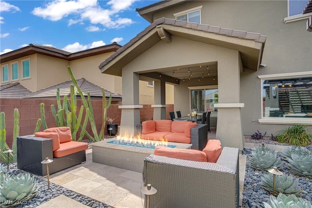 5742 Shadow Bend Dr, Las Vegas, NV 89135 - view of patio / terrace featuring an outdoor living space with a fire pit
