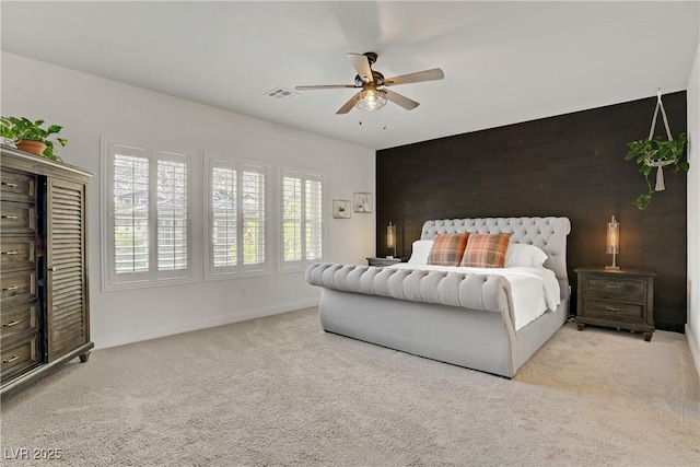 5742 Shadow Bend Dr, Las Vegas, NV 89135 - bedroom with an accent wall, carpet, baseboards, and a ceiling fan