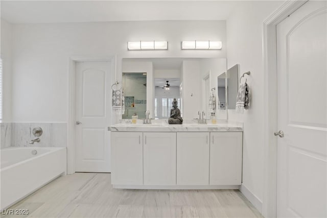 5742 Shadow Bend Dr, Las Vegas, NV 89135 - full bath featuring a ceiling fan, double vanity, and a bath
