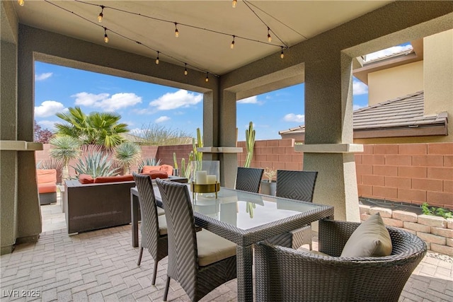 5742 Shadow Bend Dr, Las Vegas, NV 89135 - fenced backyard featuring a patio and outdoor dining area
