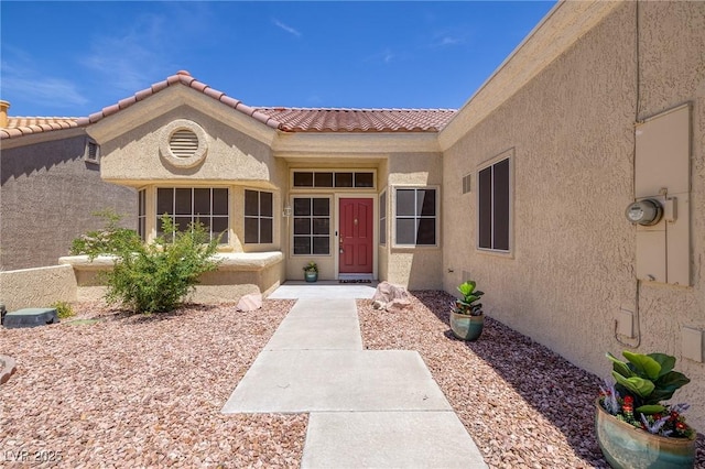 2420 Desert Butte Dr, Las Vegas, NV 89134 - entrance to property with stucco siding and a tiled roof