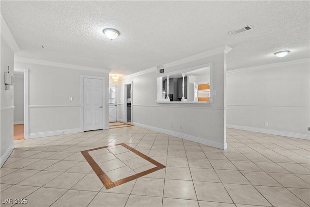5101 Churchill Ave, Las Vegas, NV 89107 - unfurnished room with a textured ceiling, ornamental molding, light tile patterned floors, and baseboards