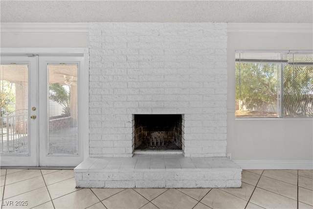 5101 Churchill Ave, Las Vegas, NV 89107 - detailed view of a textured ceiling, ornamental molding, a fireplace, french doors, and baseboards