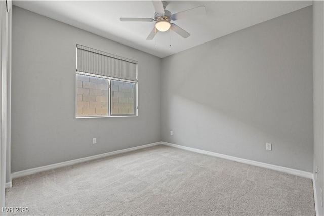 10416 Skye Arroyo Ave, Las Vegas, NV 89166 - unfurnished room featuring carpet floors, baseboards, and a ceiling fan