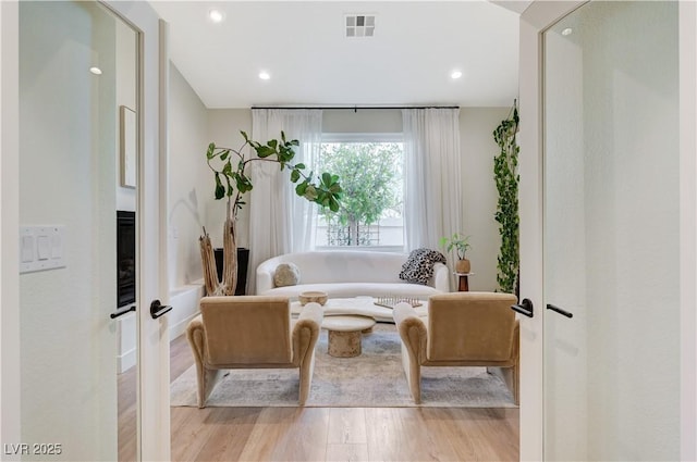 2345 Villandry Ct, Henderson, NV 89074 - living area with french doors, wood finished floors, and recessed lighting