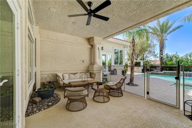 2345 Villandry Ct, Henderson, NV 89074 - view of patio / terrace with an outdoor pool, ceiling fan, and an outdoor hangout area