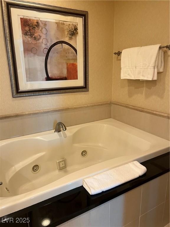 145 E Harmon Ave Unit 2409, Las Vegas, NV 89109 - full bath featuring a tub with jets