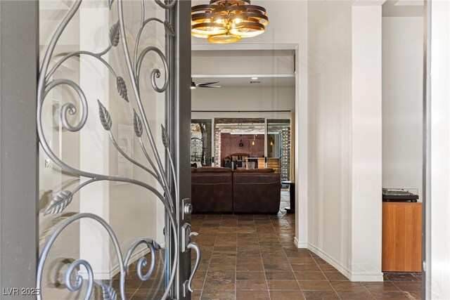 48 Panorama Crest Ave, Las Vegas, NV 89135 - foyer entrance with a chandelier and baseboards