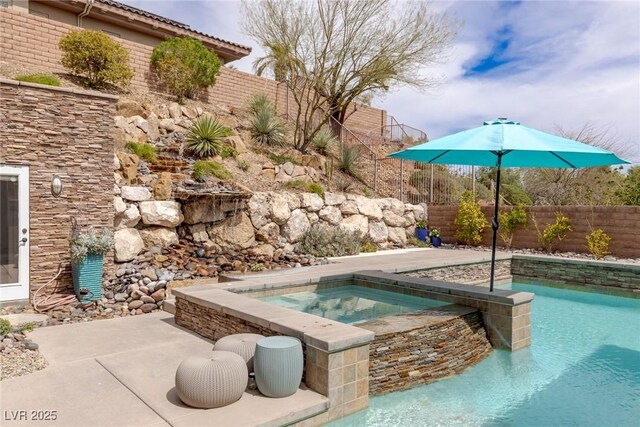 48 Panorama Crest Ave, Las Vegas, NV 89135 - view of pool with an in-ground hot tub and a fenced backyard