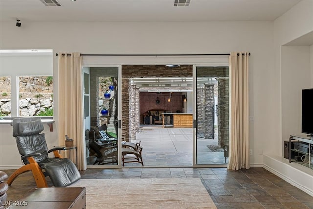 48 Panorama Crest Ave, Las Vegas, NV 89135 - doorway with stone tile floors and baseboards