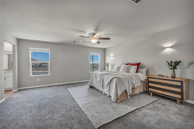 9876 Magnus Ct, Las Vegas, NV 89178 - carpeted bedroom featuring baseboards and ceiling fan