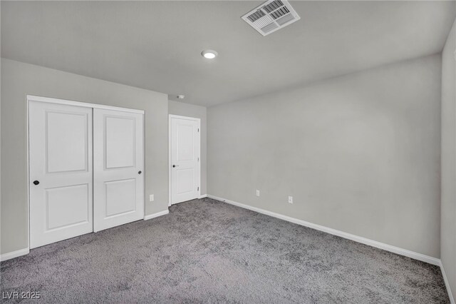 9876 Magnus Ct, Las Vegas, NV 89178 - unfurnished bedroom featuring carpet floors, baseboards, and a closet