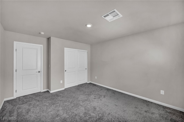 9876 Magnus Ct, Las Vegas, NV 89178 - unfurnished bedroom featuring dark colored carpet, baseboards, and recessed lighting