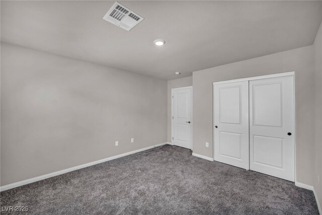 9876 Magnus Ct, Las Vegas, NV 89178 - unfurnished bedroom featuring carpet, baseboards, a closet, and recessed lighting