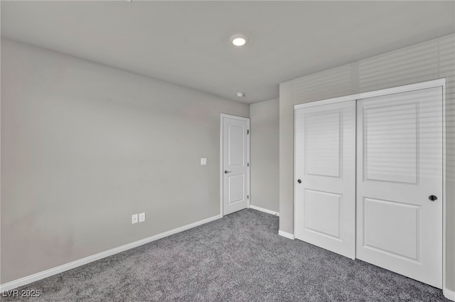 9876 Magnus Ct, Las Vegas, NV 89178 - unfurnished bedroom with baseboards, carpet flooring, and a closet