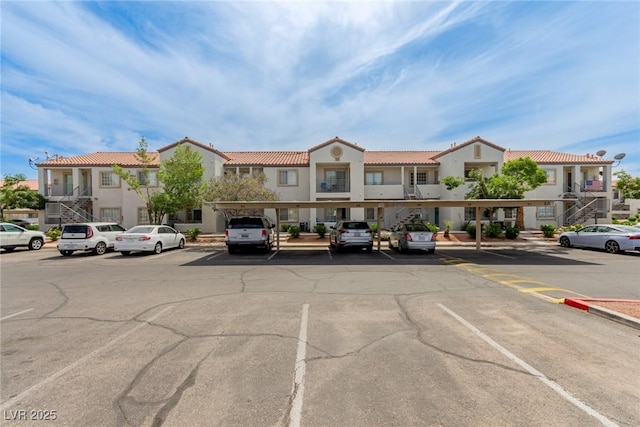 3318 N Decatur Blvd Unit 1020, Las Vegas, NV 89130 - view of property featuring covered and uncovered parking and a residential view