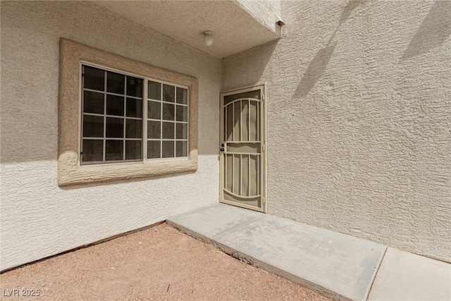 3318 N Decatur Blvd Unit 1020, Las Vegas, NV 89130 - doorway to property featuring stucco siding