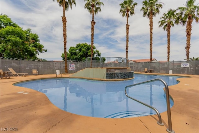 3318 N Decatur Blvd Unit 1020, Las Vegas, NV 89130 - community pool featuring a patio area